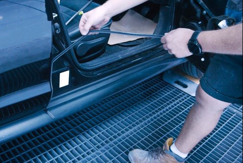 painting the repaired car